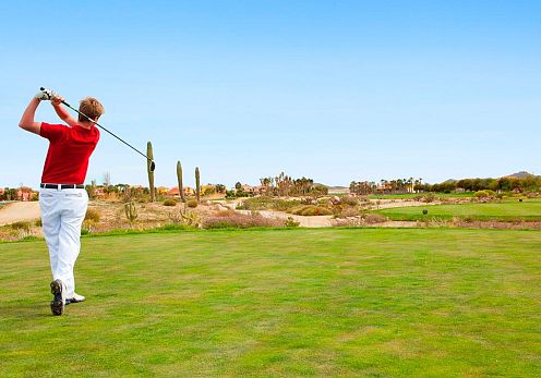 golfer practicing on the golf course of mojácar