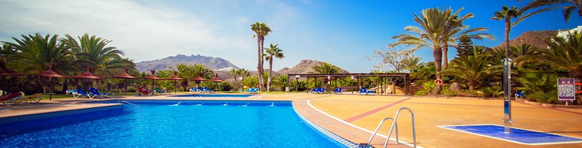 Swimming pool on the seafront at Marina Playa