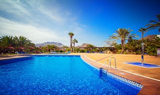 Swimming pool on the seafront at Marina Playa