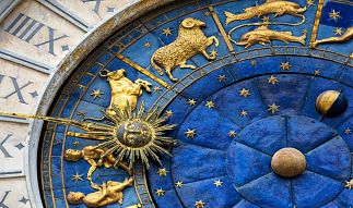 Zodiac signs on a clock