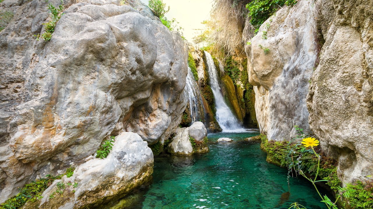 Natural pool between mountains