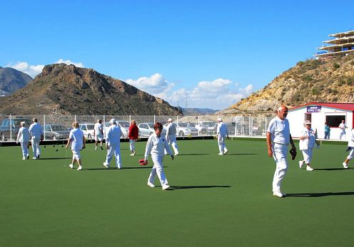 Deportistas en el campo de Bowls